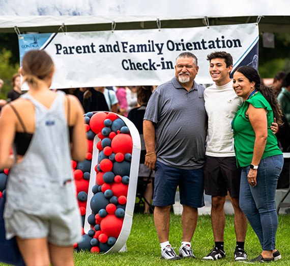 First-year students participate in the Welcome Walk during Orientation Weekend.